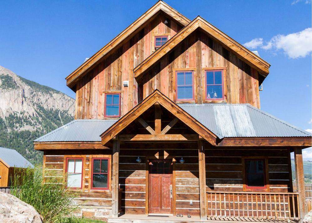 Custom Durango mountain home built by IDR with wood siding and standing-seam roof